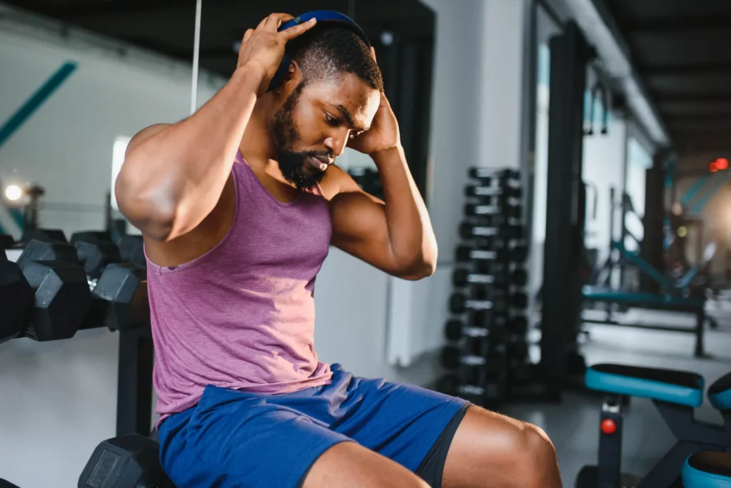 healthy african american man resting after workout utc